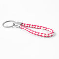 Detailed view of leather key ring in braided style accessory