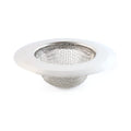 Stainless steel kitchen sink strainer filtering food particles and hair