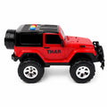 Kids' friction powered toy jeep driving on outdoor terrain