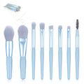 The full 8-piece mini makeup brush set with its compact travel case, ready for use.