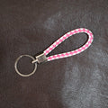 Stylish braided leather style keychain accessory with durable metal ring