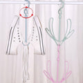 Organivo shoe drying hanger demonstrating its capacity for various shoe types.