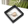 Nail clipper with unique floating keychain frame for easy portability