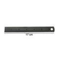 Close-up showing detailed markings on steel measuring ruler