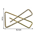 Close-up of golden crystal triangle brooch for scarf styling