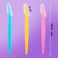 Multiple painless facial razors neatly arranged on a clean white background.