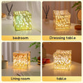 Decorative floral LED cube lamp illuminating bedroom ambience