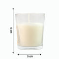Close-up of a lit Blueberry Scented Votive Candle, showing the gentle flame.