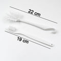 Cleaning brush on kitchen surface for effective cleaning
