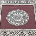 Top view of the silver pooja chowki, showcasing its exquisite mandala pattern and finish.