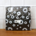 Folded LPG cylinder cover fabric showing floral print and texture