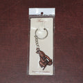 Side view of Bal Krishna metal keychain with sturdy chain and ring