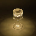 Night ambience created by warm light of LED crystal-effect table lamps