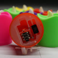 A collection of flameless LED tealight candles in a pack, highlighting their vibrant hues.