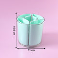 Rotating pen holder close-up showing stable base and compartment design