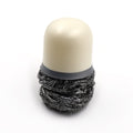 Compact Pro Clean dish cleaning brush effectively scrubbing a pot.