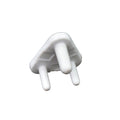 A child's hand reaching towards a covered electrical socket, demonstrating the protection of baby socket covers.