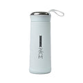 Durable glass water bottle with a protective grey silicone sleeve and bamboo lid for a firm grip.