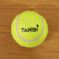 Tennis ball with bright color for easy visibility during outdoor games