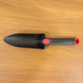 Hand garden trowel for soil preparation and planting