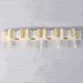 Close-up of self-adhesive broom holder rack mounted on home wall