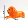 Close-up of lion dashboard toy showing adhesive base for stability