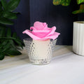 Multiple rose shaped flameless LED candles arranged for wedding decoration