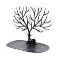 Jewellery display stand with deer antler design holding earrings