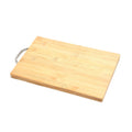 Bamboo chopping board displayed in a modern kitchen setting.