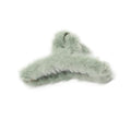 Stylish plush hair claw clip in an elegant design, suitable for various hairstyles.