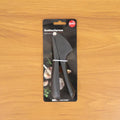 Compact handheld manual garlic press tool for efficient kitchen use
