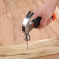 A hand holding the ergonomic plastic grip of the portable hammer, demonstrating comfort.