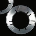 Energy-saving Gas Stove Stand placed on a burner for efficient cooking.