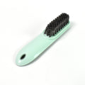The versatile household scrubber shown with water, ready for deep cleaning.