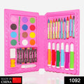Open Kids Art Kit displaying crayons, watercolor cakes, sketch pens, and accessories.