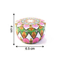 Decorative mandala metal candle container showcasing vibrant colors