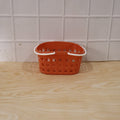 Basket in outdoor picnic setting for fruits and essentials