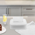 Foldable silicone tissue holder complements a modern living space.