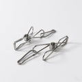 Durable stainless steel clothes pegs holding clothes securely