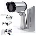 Easy-to-install dummy security camera with a visible flashing light, ideal for deterring intruders.