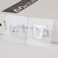 Multiple adhesive hooks displayed together, showcasing versatile use.