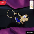 Close-up of Krishna enamel peacock design on metal keyring