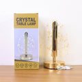 Lifestyle photo of golden crystal leaf LED desk lamp during evening lighting