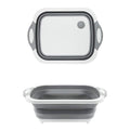 Compact foldable chopping board with dish rack and washing bowl features.