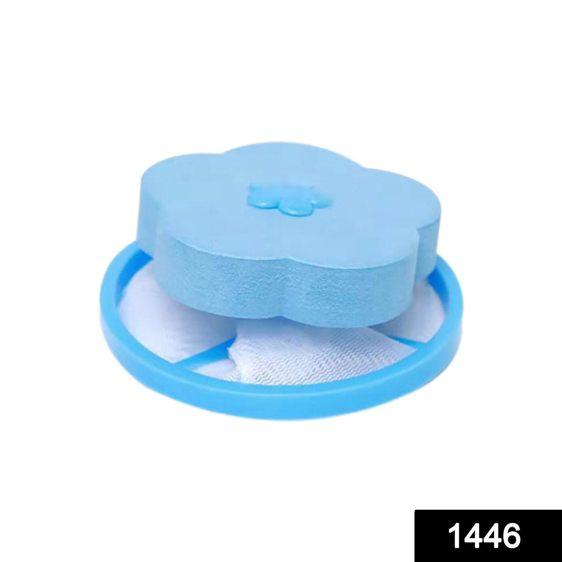 Floating washing machine lint catcher with a pink flower detail.