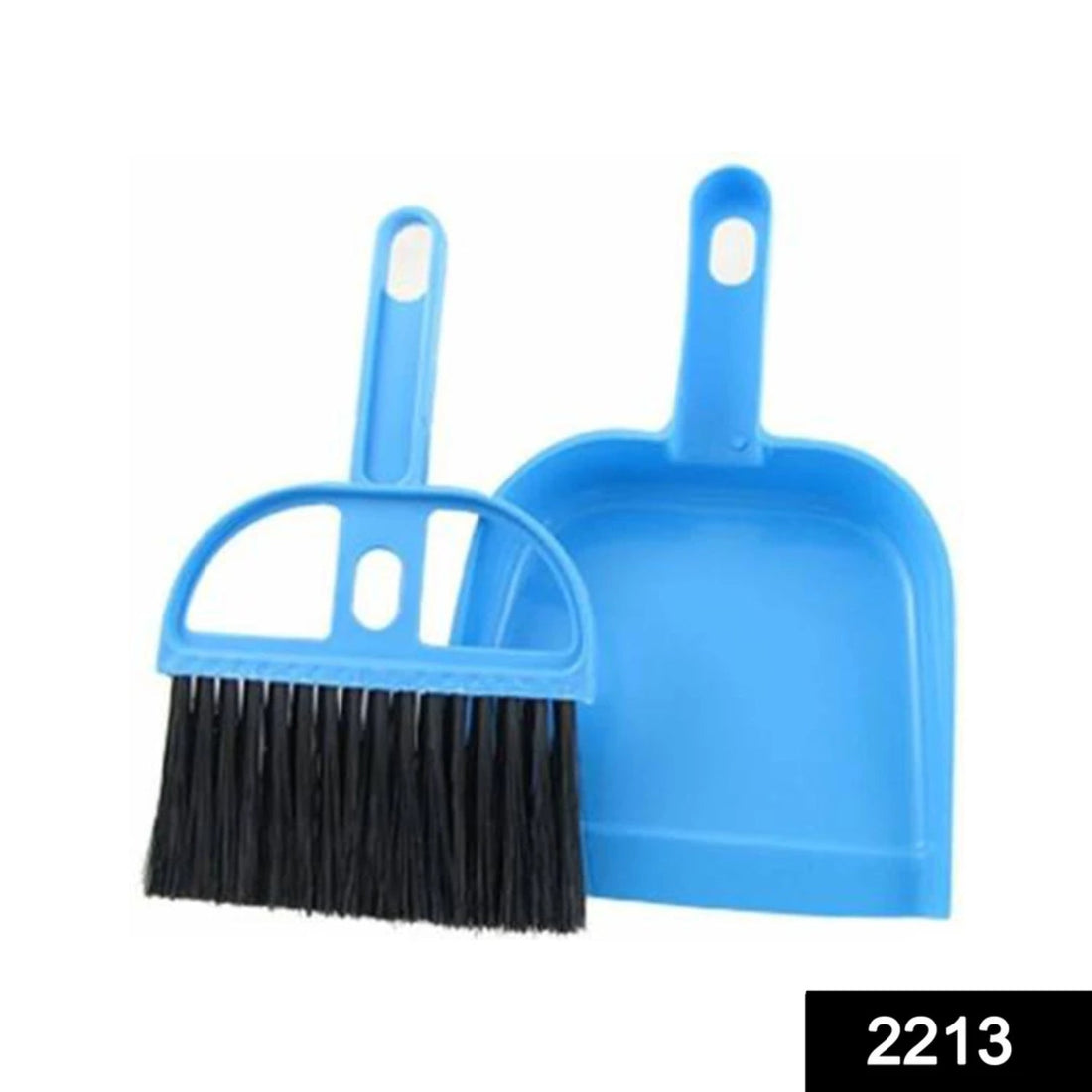 Velvet Wipe mini dustpan and brush set for quick kitchen cleanups.