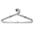 Stack of space-saving stainless steel hangers, highlighting their slim profile for closet organization.