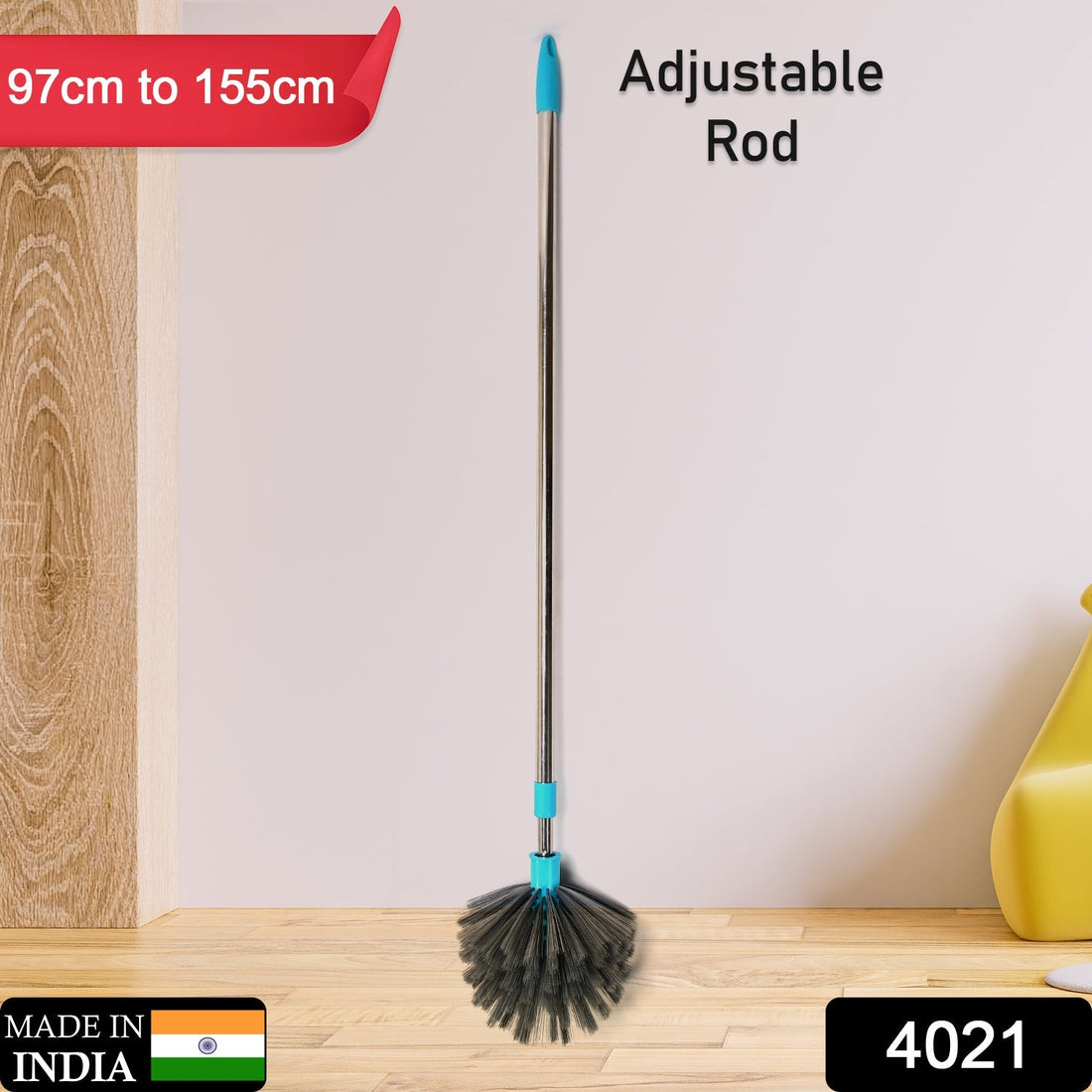 Extendable cobweb cleaning brush with stainless steel handle reaching a high ceiling.