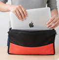 Inside view of the laptop sleeve, demonstrating its soft lining for scratch prevention.