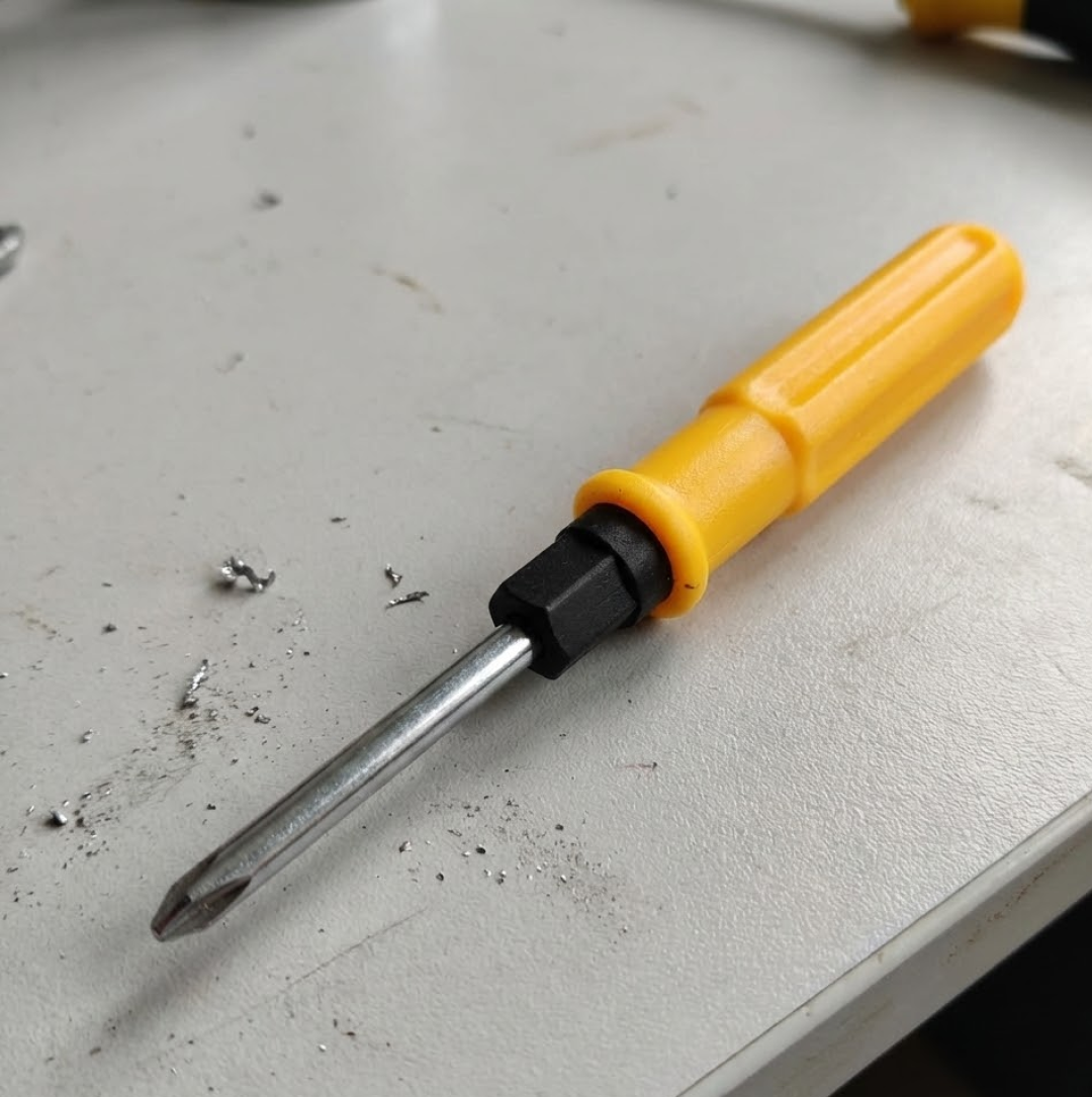 Compact XcelGrip Multipurpose Screwdriver, ready for various tasks.